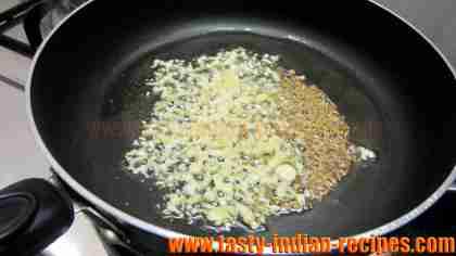 adding-cumins-ginger-garlic-paste adding-cumins-ginger-garlic-paste