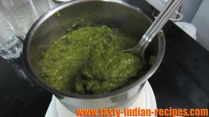 Grinding the chutney by adding some water