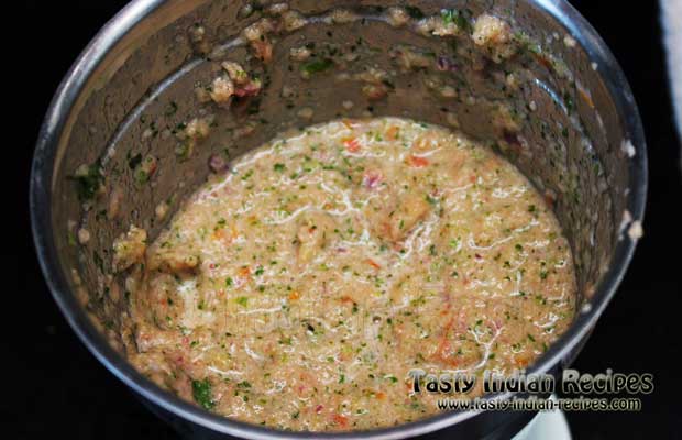 Grind the mixture in a coarse paste and keep aside Grind the mixture in a coarse paste and keep aside