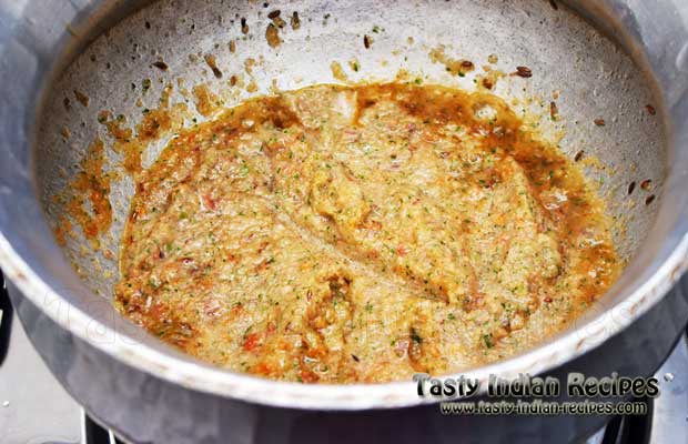 Heat oil in a vessel and saute cumin and fennel seeds on low flame till they starts to pop up and then add prepared onion paste