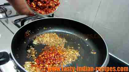 adding-crushed-red-chillies