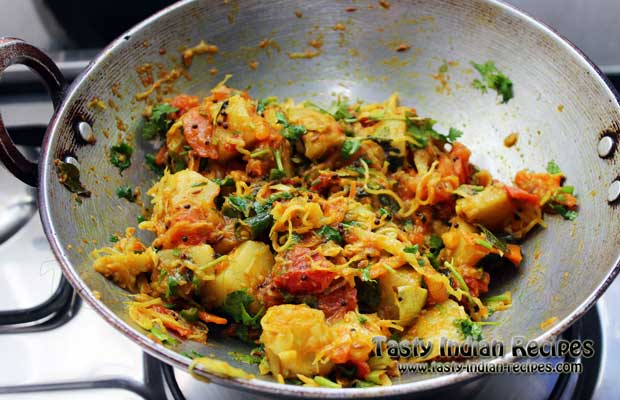 Cook for 2 more minutes and garnish with finely chopped coriander leaves