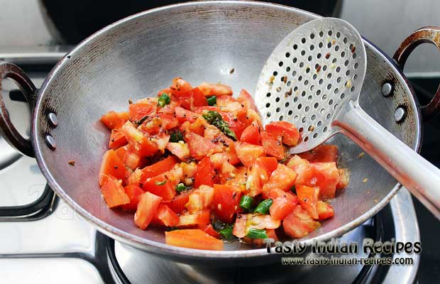 Add chopped tomatoes along with green chilies and cook continue for 2 minutes