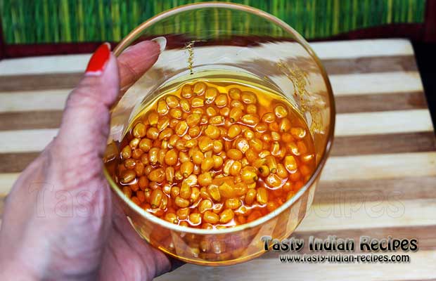 Mix the Corn seeds, butter, oil, salt and turmeric powder in a microwave proof bowl