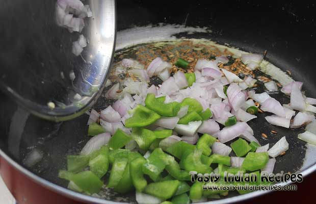 Add chopped onion along with capsicum Add chopped onion along with capsicum