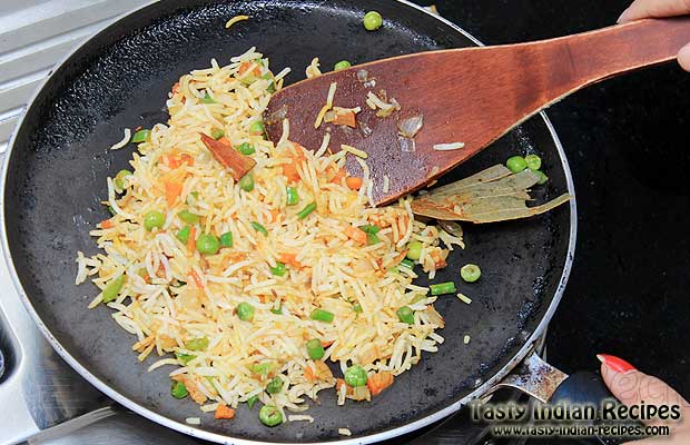 Cooking Tawa Pulao on Tawa