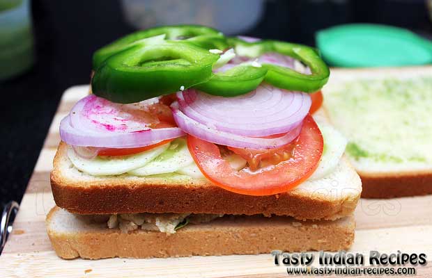 Cover the sandwich with third bread slice by keeping chutney side down now and your Vegetable Grill Sandwich is ready for grilling
