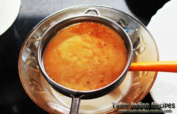 Straining Through Tea Sieve