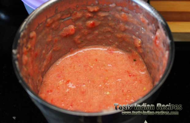 Mix the onion, tomatoes, ginger, garlic and coriander in the blender and blend into a smooth puree