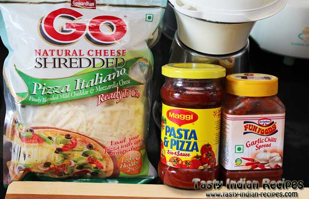 Few Ready Ingredients for making Cheese Pizza